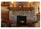 Reclaimed wood meets modern fireplace design with Stone Selex